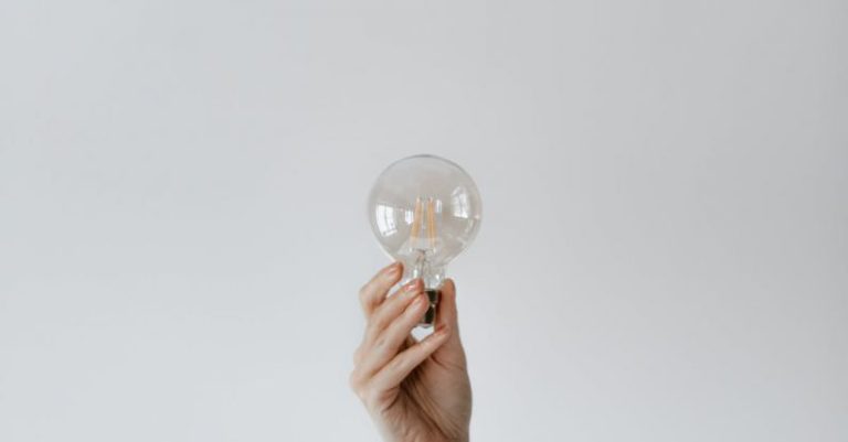 Efficient Workflows - Anonymous female showing light bulb