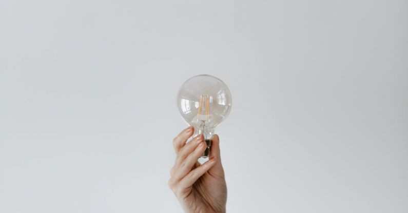 Efficient Workflows - Anonymous female showing light bulb