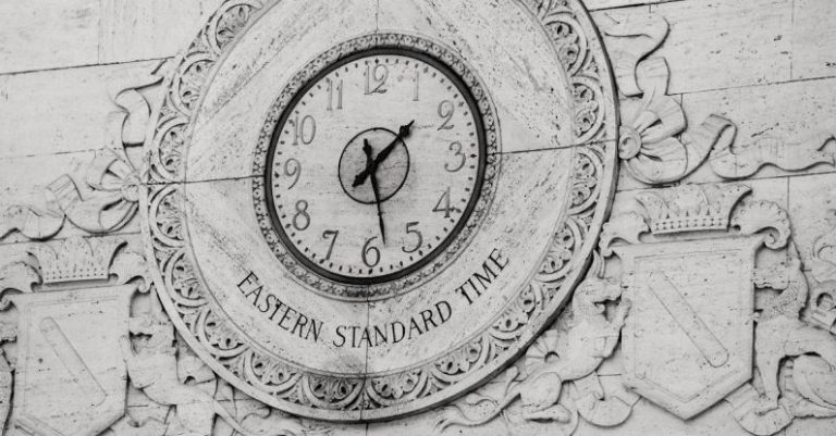 Standardized Workflows - Engraving of emblem with clock on stone wall