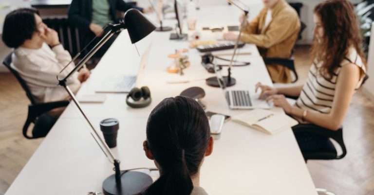 Prioritize Tasks - People in a Meeting