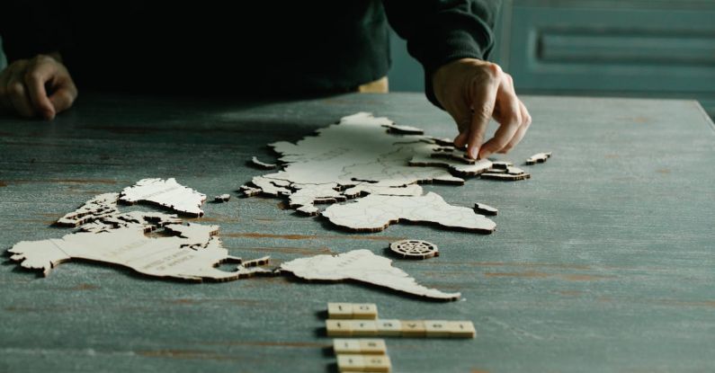 Completing Lists - Person Completing a World Puzzle