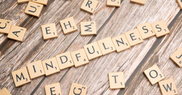 Mental Clarity - The word mindfulness spelled out with scrabble tiles