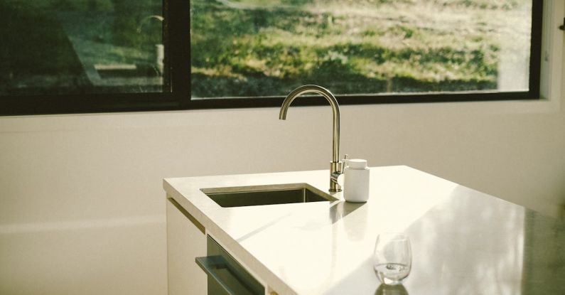 Minimizing Interruptions - A kitchen sink with a window in the background