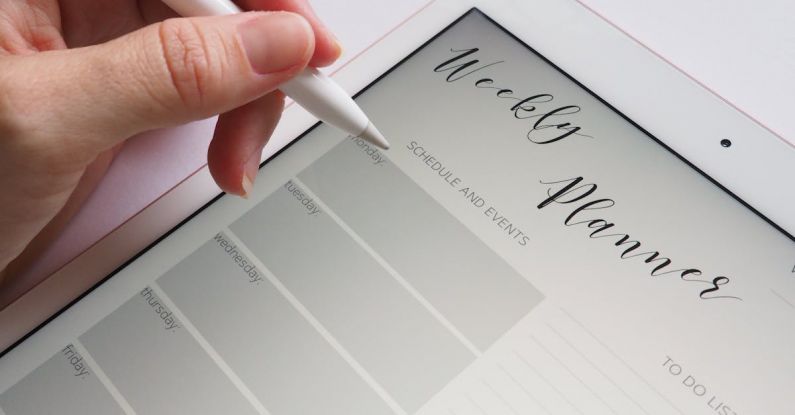 Weekly Planning - Person Holding White Stylus