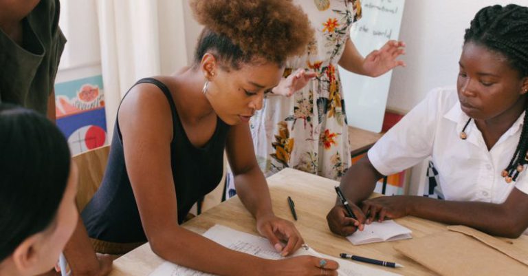 Collaborative Planning - Photo of Women at the Meeting